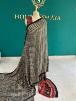 Pure Modal Silk Black & Cream Patterned Saree with Red Ethnic Pallu - Image 3