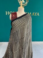 Pure Modal Silk Black & Cream Patterned Saree with Red Ethnic Pallu - Image 2