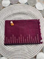 Wine Linen Saree with Golden Threadwork and Tassel Detailing