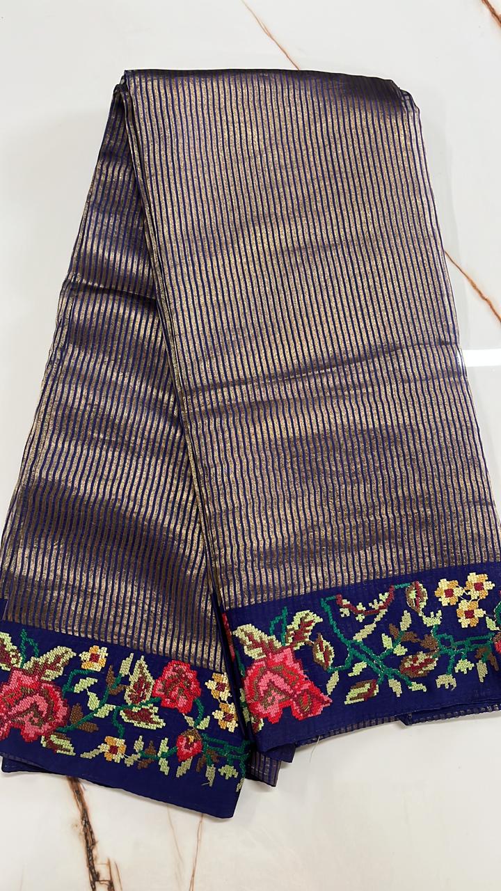 WhatsApp Image 2026-01-28 at 10.55.10 AM Kora Tissue Saree in Navy Blue with Gold Stripe Weave & Floral Border - Image 1