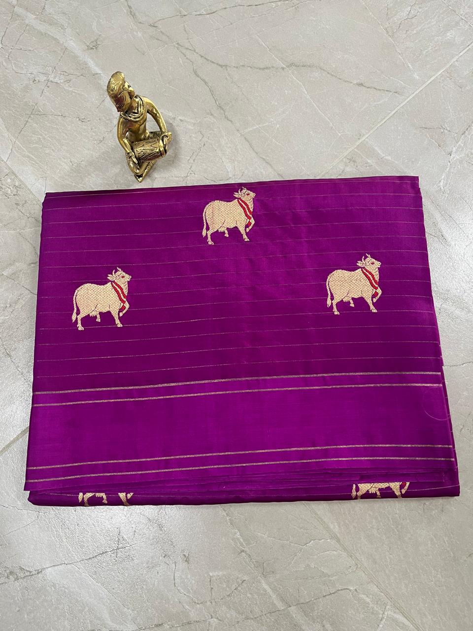 WhatsApp Image 2026-01-28 at 10.56.19 AM Raw Mango Silk Saree in Royal Purple with Gold Cow Motifs - Image 1