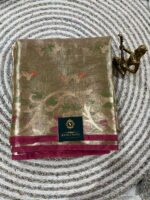 Elegant Gold-Toned Semi Tissue Saree with Floral Weave & Contrast Border - Image 2