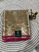 Elegant Gold-Toned Semi Tissue Saree with Floral Weave & Contrast Border