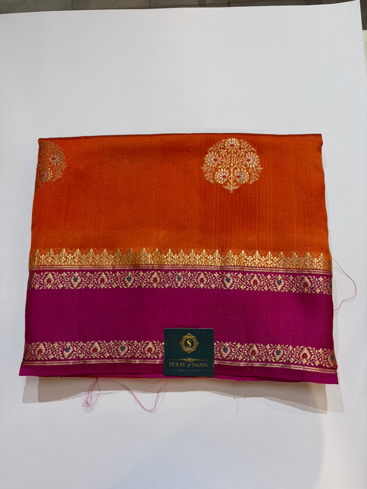 WhatsApp Image 2026-01-30 at 5.29.21 PM (1) Rust Orange & Magenta Raw Mango Silk Saree with Antique Gold Zari Border - Image 1