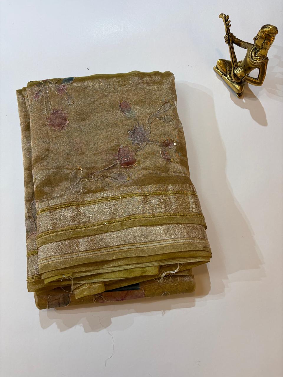 WhatsApp Image 2026-01-31 at 6.08.24 PM Pure Tissue Saree with Handcrafted Floral Embellishments & Subtle Zari Border - Image 1