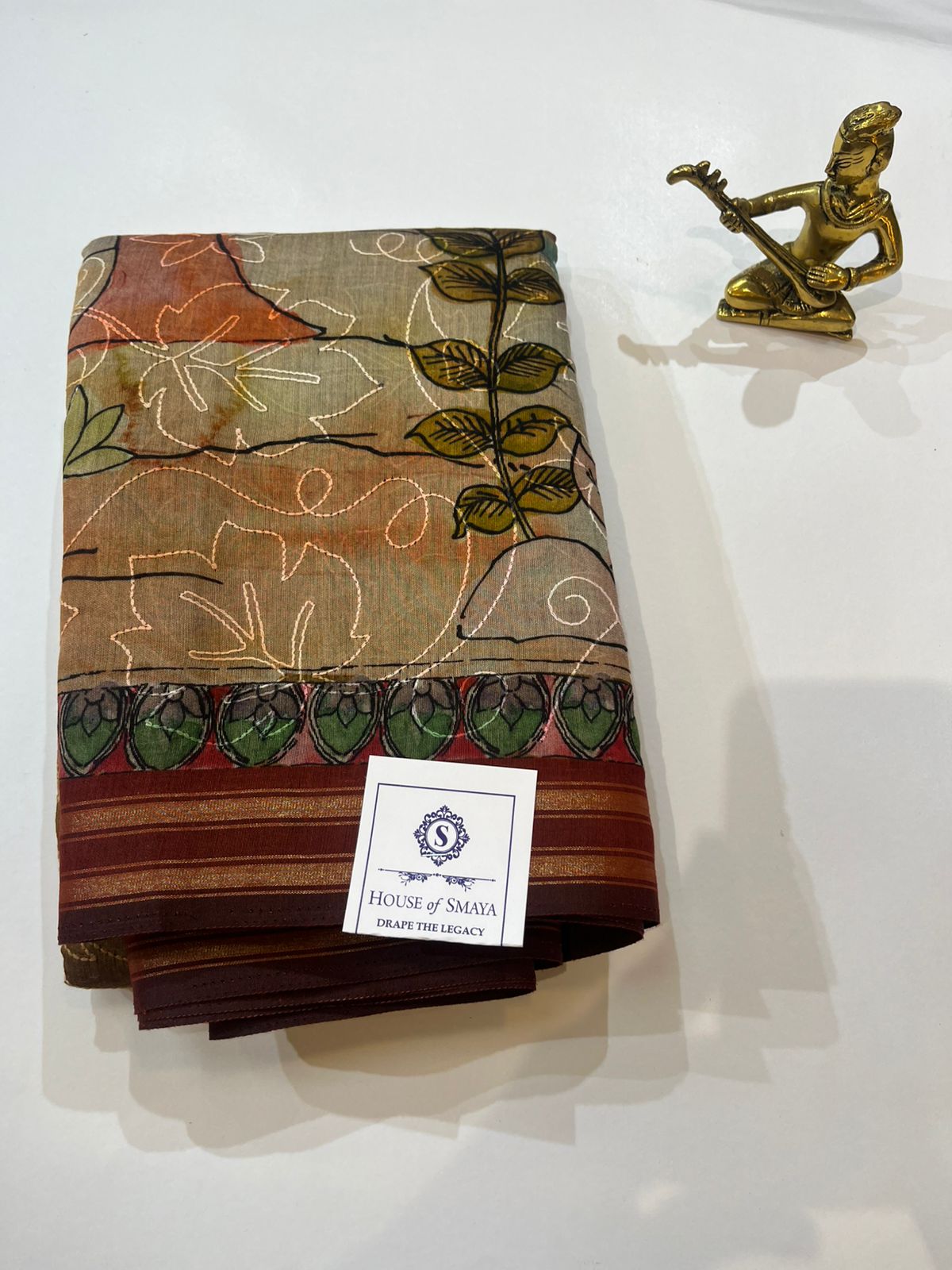 WhatsApp Image 2026-01-31 at 6.41.18 PM Earthy Brown Abstract Floral Printed Viscose Saree with Contrast Border - Image 1