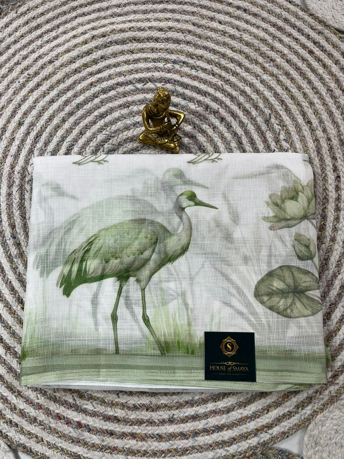 WhatsApp Image 2026-01-31 at 8.23.34 PM Ivory Kora Cotton Saree with Sage Green Bird & Lotus Leaf Print - Image 1